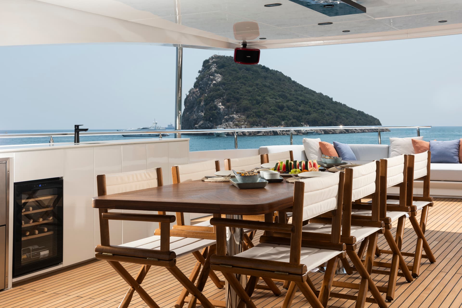Shaded alfresco dining table for ten